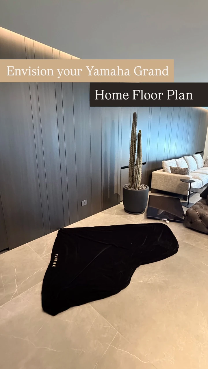 A grand piano's footprint laid on a client's floor to plan its place
