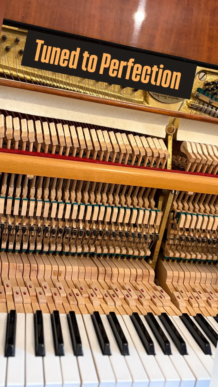 An upright piano action, tuned to perfection